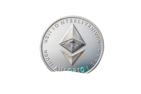 Silberne Ethereum-M&uuml;nze auf Sand, OnlySpins Casino Krypto-Zahlung mit Ethereum
